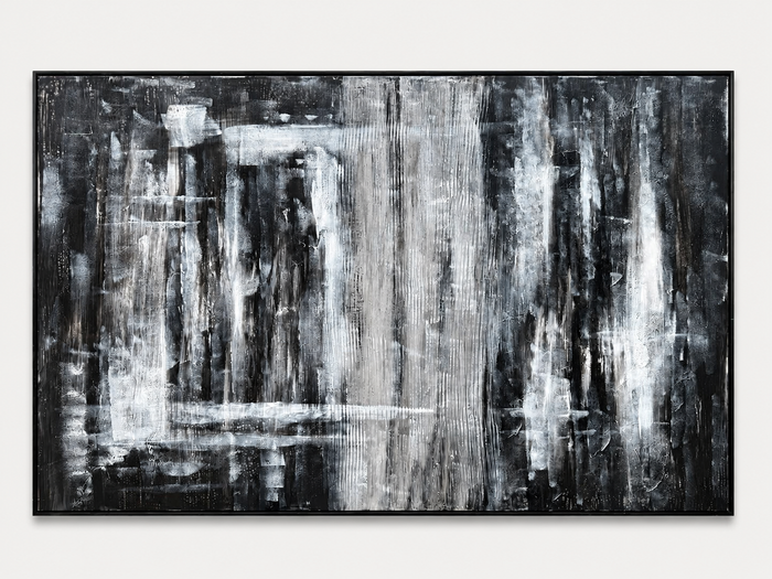 Black and white vertical drip abstract in a black frame