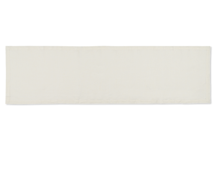 A linen table runner in the color oyster