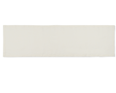 A linen table runner in the color oyster