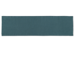 A linen table runner in the color peacock