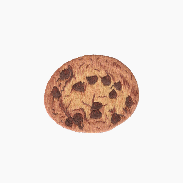 Hand embroidered cotton towel with chocolate chip cookie motif on a white background