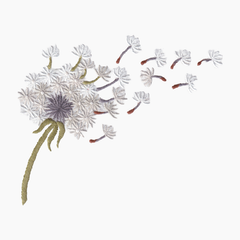 Hand embroidered cotton towel of a dandelion with seeds blowing away on a white background
