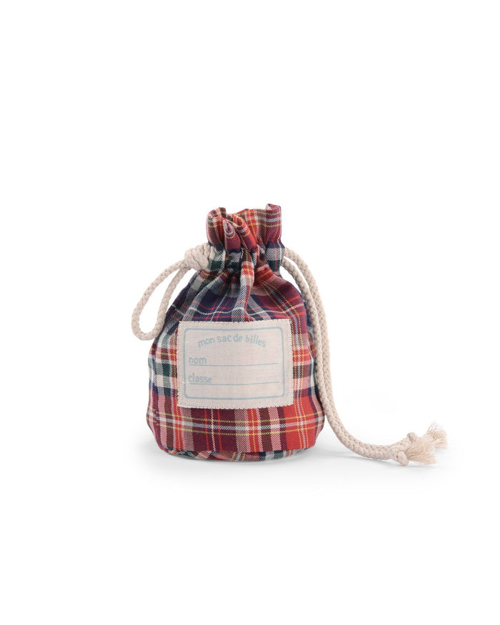Plaid drawstring bag with a label on a white background