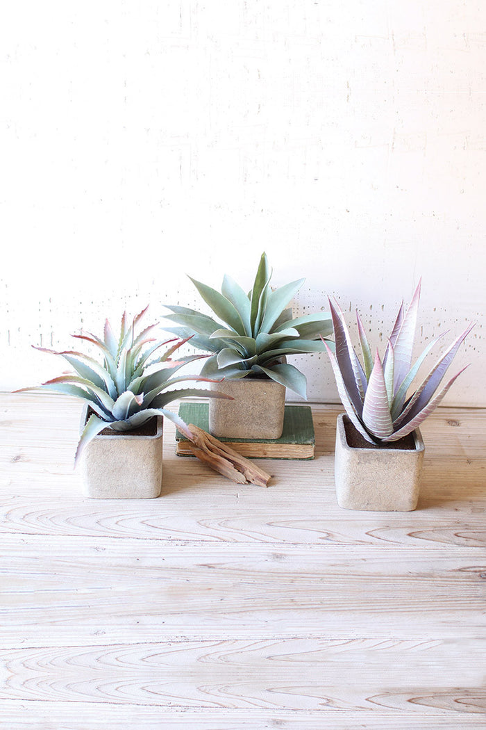 large artificial succulents in square pot