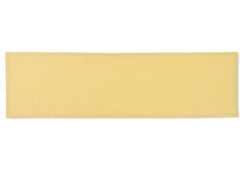 A linen table runner in the color butter